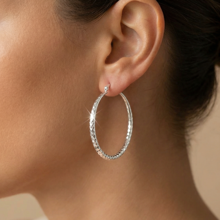 Lumara – Diamond-Cut Hoop Earrings