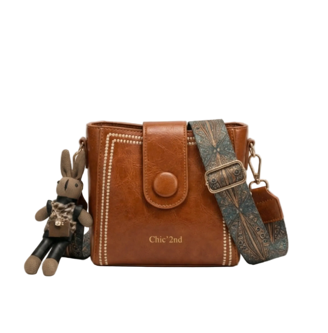 Trovata - Vintage crossbody bucket bag with artisan strap