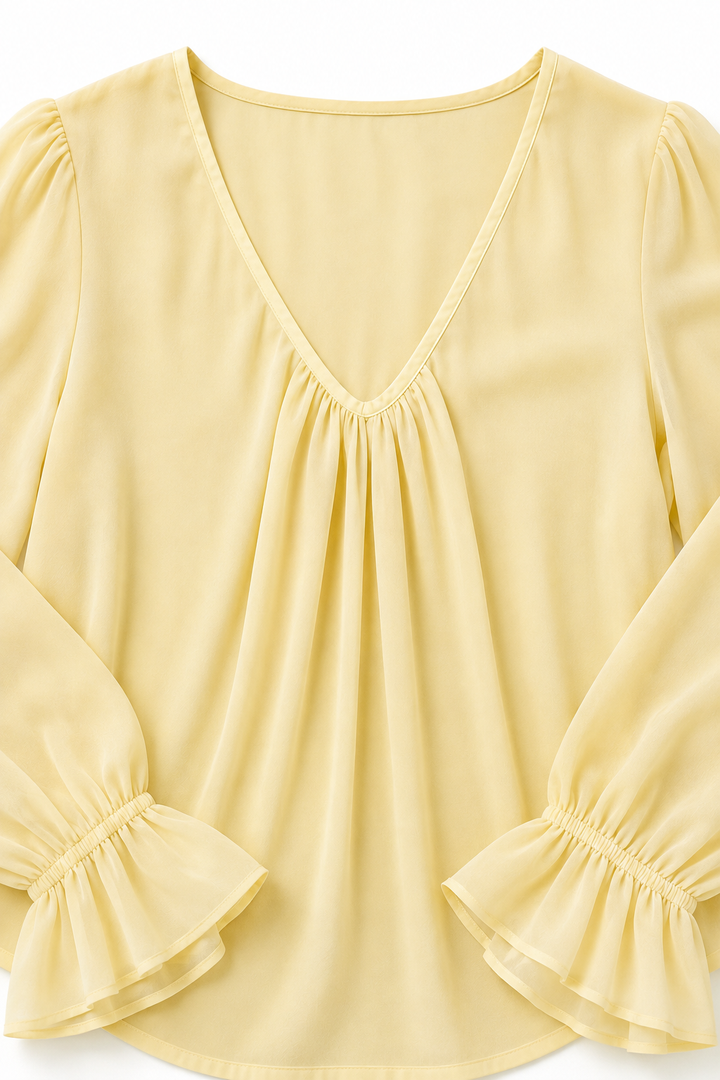 Pleatrelle – V-Neck Pleated Blouse With Ruffled Cuffs