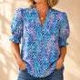 Elowen – Women's V-Neck Puff Sleeve Blouse with Smocked Cuffs, Flowy Floral Top