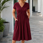Marabelle – V-Neck Cross-Front Pleated Midi Dress with Pockets