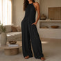 Drevana – Halter Wide-Leg Jumpsuit with Deep Pockets, Flowy Drape