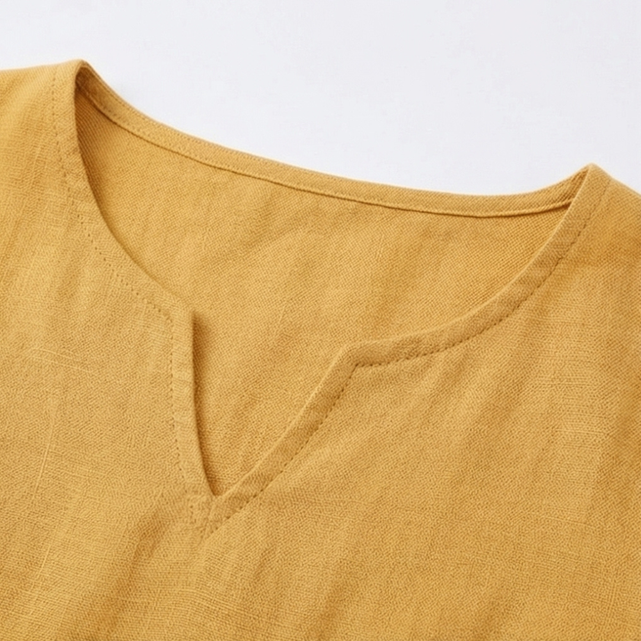 Solenne – Relaxed V-Neck Midi Dress with Pockets