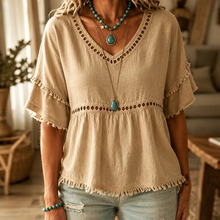 Meloria – Bohemian Babydoll Top with Eyelet Cutouts and Fringe Hem