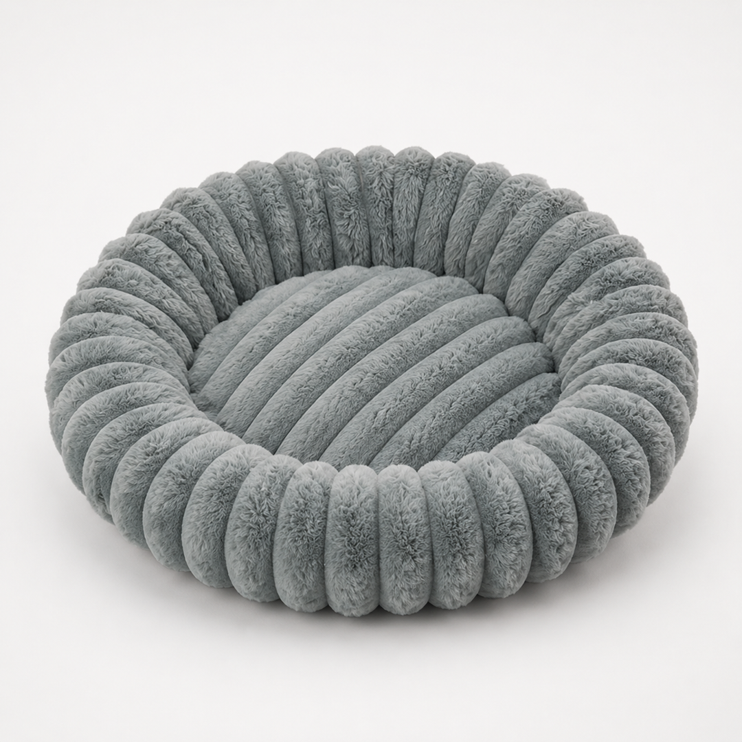 Nestwell – Raised-Edge Round Calming Plush Pet Bed