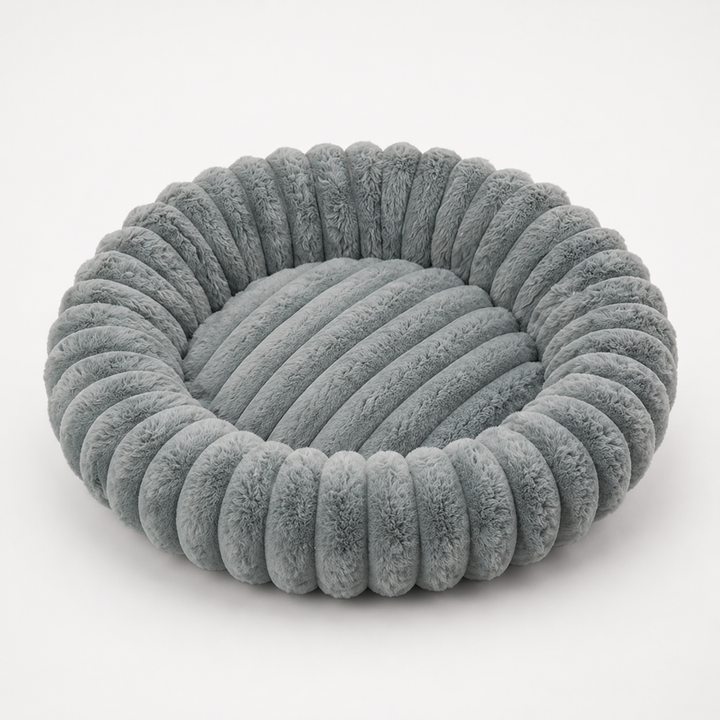 Nestwell – Raised-Edge Round Calming Plush Pet Bed