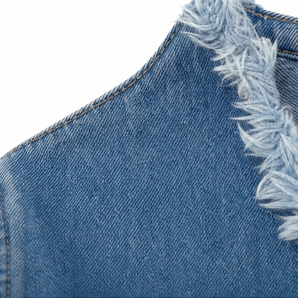 Slantelle – Asymmetrical Buttoned Raw-Edge Denim Blouse
