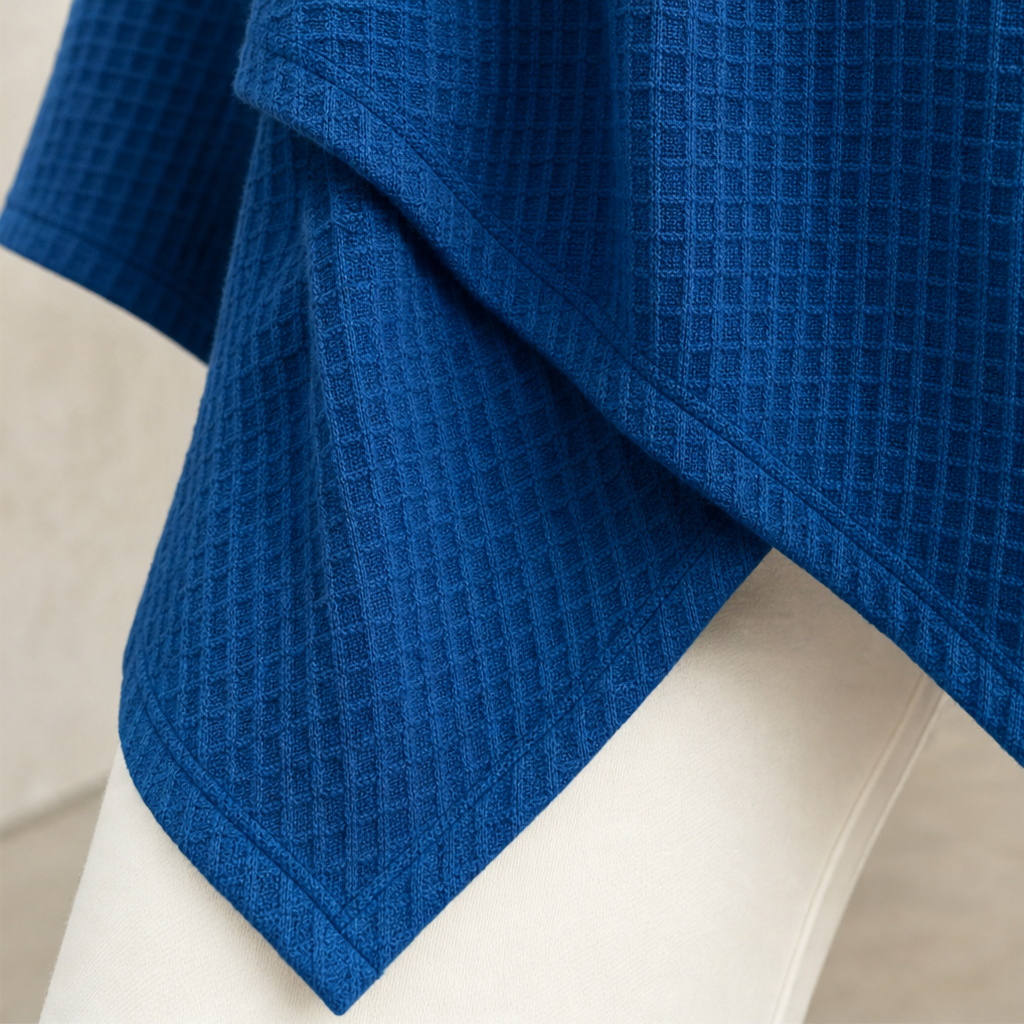 Drapella – Asymmetric Crossover Hem Waffle Knit Top