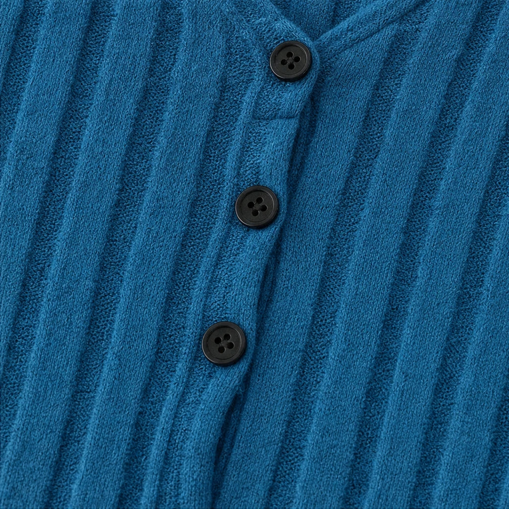 Vellora – Ribbed V-Neck Peplum Top