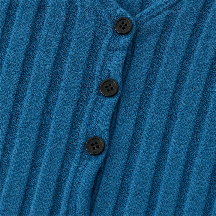 Vellora – Ribbed V-Neck Peplum Top