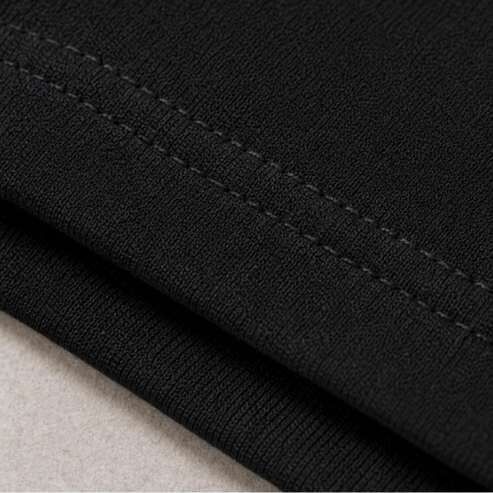 Vellora – PU Cross-Detail V-Neck Long-Sleeve Top