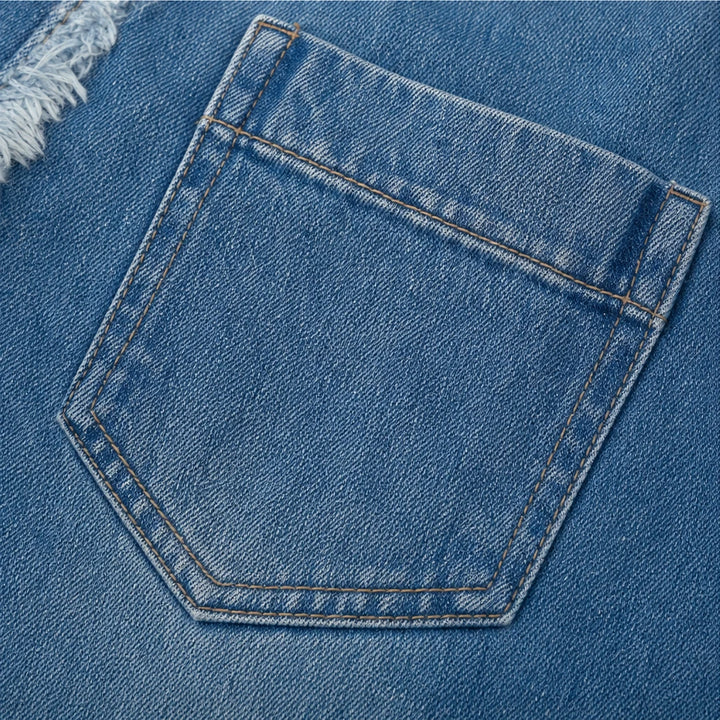 Slantelle – Asymmetrical Buttoned Raw-Edge Denim Blouse