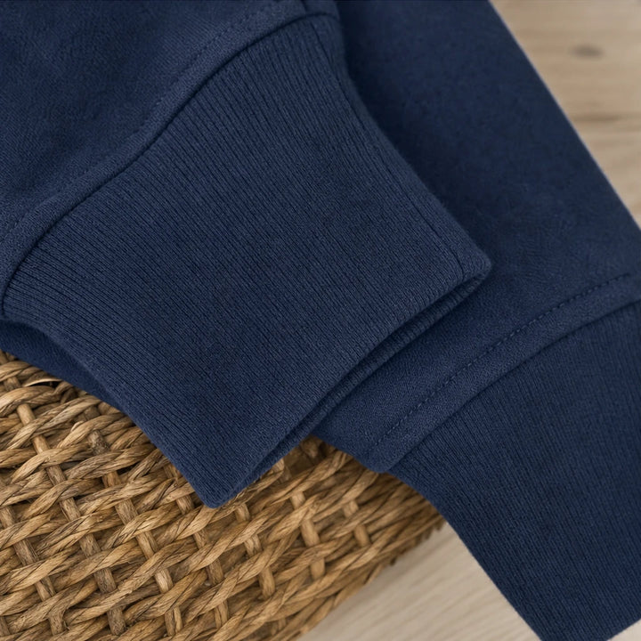 Placket & Poise – Three-Button Hooded Sweatshirt