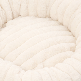 Nestwell – Raised-Edge Round Calming Plush Pet Bed