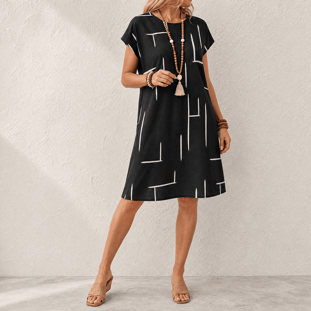 Elunara – Women's Pocketed Dolman Dress with Abstract Print Black