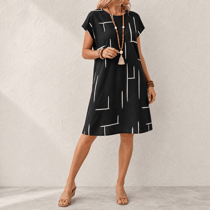 Elunara – Women's Pocketed Dolman Dress with Abstract Print Black