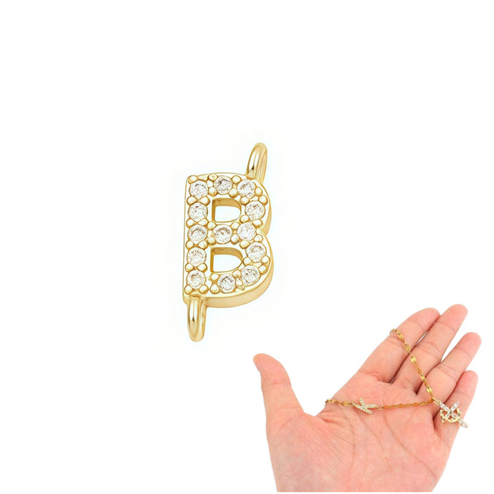 Aurela – Sparkling Initial Cross Necklace