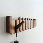 Pianello – Contoured Wood Wall Hanger with Fold-Down Hooks