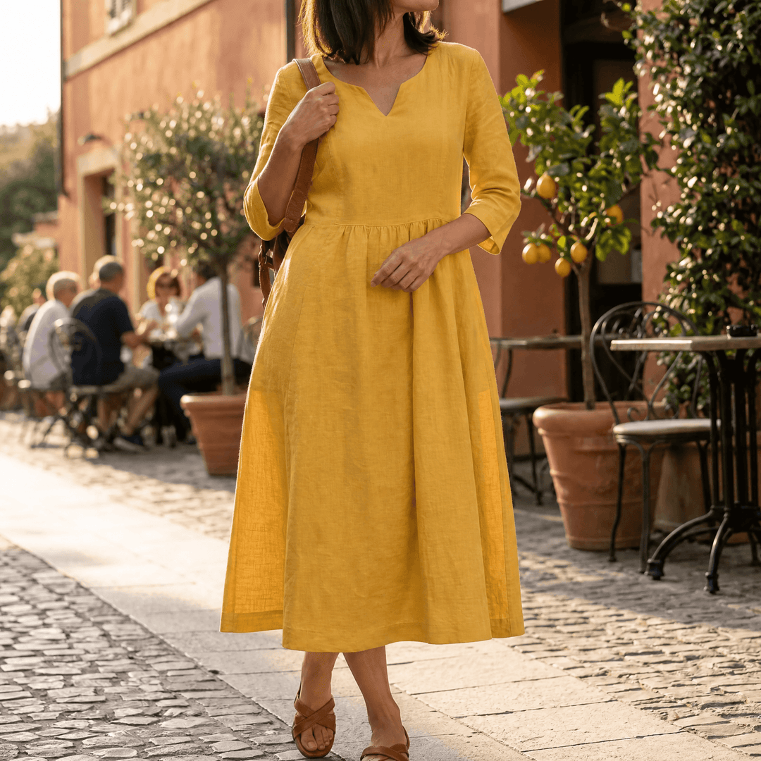 Solenne – Relaxed V-Neck Midi Dress with Pockets yellow