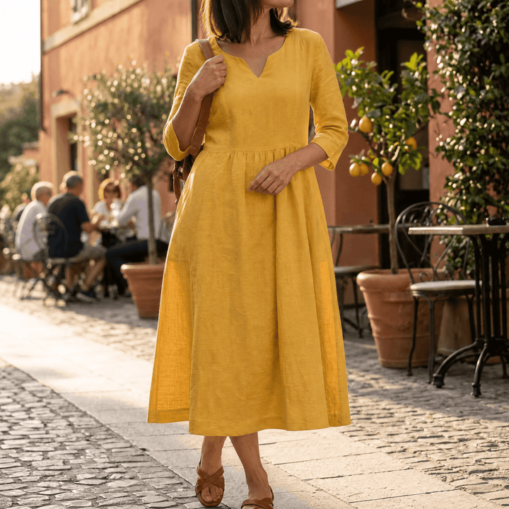 Solenne – Relaxed V-Neck Midi Dress with Pockets yellow