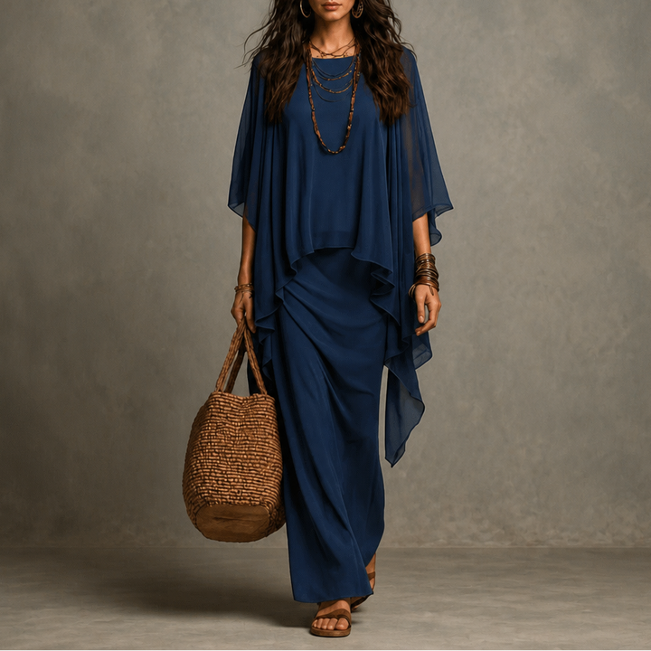 Draperie – Cape Sleeve Asymmetric Hem Maxi Dress